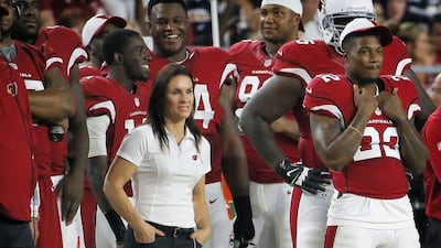 Arizona Cardinals training camp coach Jen Welter watches an NFL pre-season game from the sideline last month. Matt York / AP / August 22, 2015