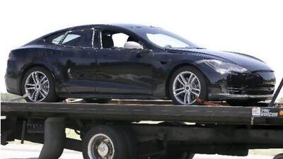 The Tesla Model S is spotted en-route to a track for testing. Courtesy of Lehmann Photo-Syndication