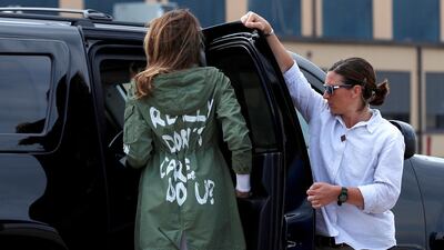 US first lady Melania Trump climbs into her motorcade vehicle wearing a Zara design jacket with the phrase "I Really Don't Care. Do U?" on the back as she returns to Washington from a visit to the US-Mexico border area in Texas, at Joint Base Andrews, Maryland, on June 21, 2018. Reuters