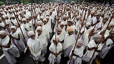 Some of the 486 children, between the ages of 10 and 16, dressed as Mahatma Gandhi on their peace march in Kolkata, India. They broke the Guinness World Record of most children dressed as Gandhi, previously set at 255 in 2010.