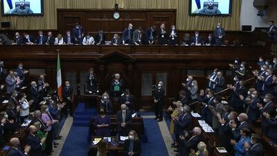 Members in the Dail give Mr Zelenskyy a standing ovation after his speech. PA