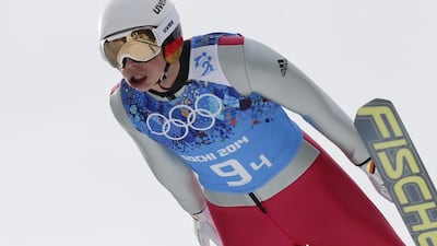 Germany's Eric Frenzel take tothe air during the ski jumping portion of the Nordic combined large hill team competition on Feb. 20, 2014, in Krasnaya Polyana, Russia. Dmitry Lovetsky / AP Photo