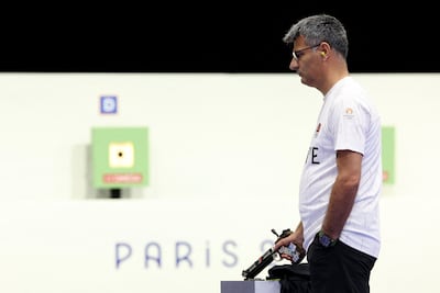 Turkey's Yusuf Dikec won silver in the Mixed 50-metre shooting event, despite lacking all the standard competition gear. AFP
