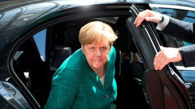 German Chancellor Angela Merkel arrives for an EU summit that could define - or end - her new government. / AFP / POOL / Virginia Mayo