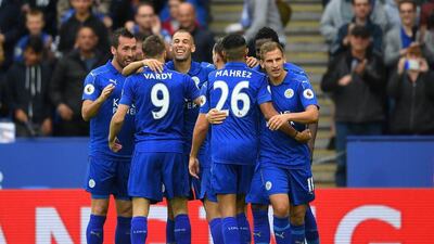 Islam Slimani of Leicester City celebrates scoring his side’s second goal with his teammates. Laurence Griffiths / Getty Images