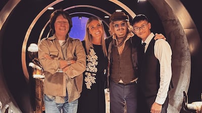 Johnny Depp and Jeff Beck with staff of Varanasi restaurant in Birmingham. Photo: Instagram / varanasi.restaurants