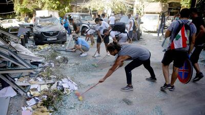 Lebanese activists take part in a campaign to clean the damaged neighbourhood of Mar Mikhael. AFP