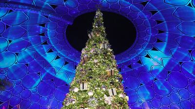 The AL Wasl Plaza dome provides a spectacular backdrop for the Christmas Tree lighting ceremony in Expo City Dubai. Pawan Singh / The National