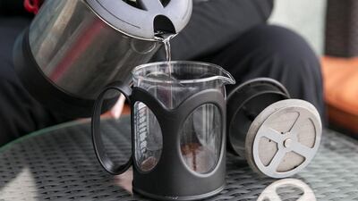 Step 3: Add hot water to the French press. Silvia Razgova / The National