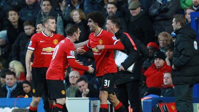 Marouane Fellaini, No31, came off the bench to score Manchester United's opener against Queens Park Rangers. Sean Dempsey/EPA