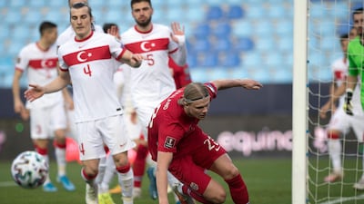 Norway's Erling Braut Haaland attempts to retrieve the ball against Turkey. AFP