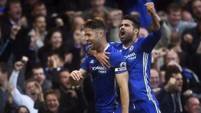 Chelsea’s Gary Cahill, left, is congratulated by teammate Diego Costa. Will Oliver / EPA