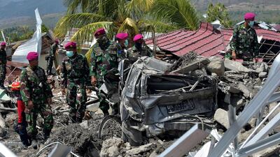 Indonesian Marines search for survivors in Palu, Indonesia's Central Sulawesi, on October 2, 2018. AFP
