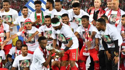 Oman players celebrate after winning the Gulf Cup of Nations 2017 final on penalties. Giuseppe Cacace / AFP