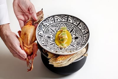 Poached quail in acidulated corn, mocilla and pickled almonds at Noor. Photo: @noorrestaurant / Instagram