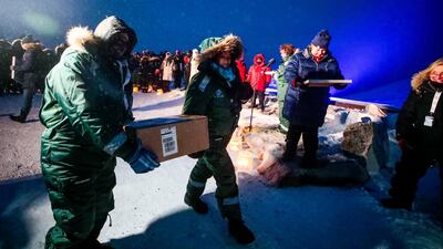 Representatives from many countries and universities arrive in the Svalbard's global seed vault with new seeds. NTB Scanpix via Reuters