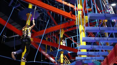 Rope Rush features a 230-metre network of metal ropes and poles, with 44 obstacles and eight inclines that vary in difficulty. Pawan Singh / The National