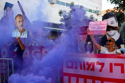 Supporters of hostages held by Hamas in Gaza protest in Tel Aviv ahead of ceasefire talks in Qatar. Reuters