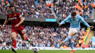 Manchester City's Julian Alvarez, right, scores his side's fifth goal. AP