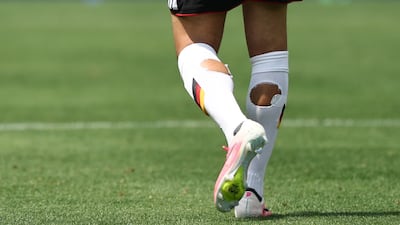 Leroy Sané of Germany with holes cut out of his socks during training in Massachusetts. Getty Images