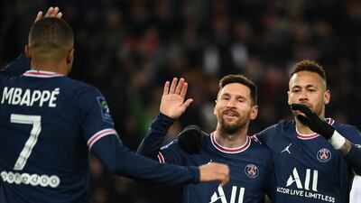 Lionel Messi celebrates with Neymar and Kylian Mbappe after scoring PSG's fourth goal. AFP