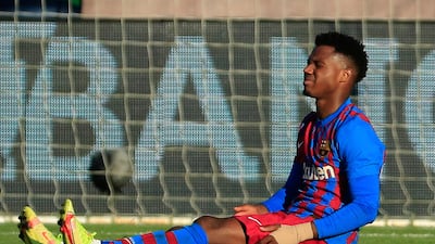 Barcelona's Ansu Fati, sits injured during the Spanish La Liga 3-3 draw at between Celta Vigo. AP