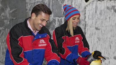 Giuliana and Bill Rancic at Mall of the Emirates cuddling with penguins in the snow-capped hills of Ski Dubai. Courtesy Ski Dubai