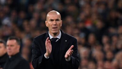 Real Madrid's French coach Zinedine Zidane applauds at the final whistle. AFP