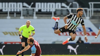 Joelinton of Newcastle is tackled by Craig Dawson of West Ham. EPA