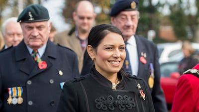 Priti Patel attends a remembrance service in Essex on Saturday. David Mirzoeff / PA via AP