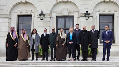 UK Foreign Secretary Liz Truss, centre, poses for a photograph with members of the Gulf Co-operation Council (GCC) at Chevening House. Photo: Downing St handout