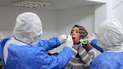 Medics perform an examination on a rescued Syrian refugee in the Iskele district (Trikomo) in the self-declared Turkish Republic of North Cyprus (TRNC) recognised only by Turkey, north of Famagusta. AFP