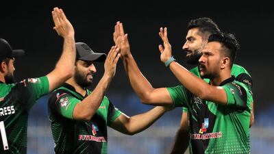 Umair Ali of Future Mattress celebrates taking a wicket in the Sharjah Ramadan Cup final against MCM Cricket Club.