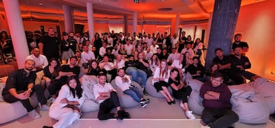 Huspy co-founder Jad Antoun, centre, with some of the team. The company has added 100 people — a third of the total headcount — in the UAE and Spain in the past three months. Photo: Huspy