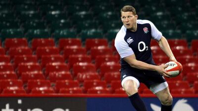 England's Dylan Hartley passes the ball during a training session at the Millennium Stadium in Cardiff on March 15, 2013 on the eve of their final Six Nations international rugby union match against Wales. Geoff Caddick / AFP