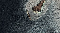 The Caroline Bezengi, a vessel under UK and EU sanctions over suspected links to Russia, is stuck near Oman's Hallaniyat islands and leaking oil. Reuters
