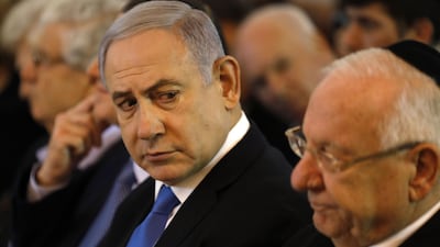 Israeli Prime Minister Benjamin Netanyahu (L) and President Reuven Rivlin attend a ceremony in tribute to the recently deceased former Supreme Court president Meir Shamgar, in Jerusalem on October 22, 2019. AFP