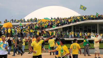 Supporters of Bolsonaro storm the National Congress in Brasilia in 2023. They had called for the military to help overthrow President Luiz Inacio Lula da Silva. AFP