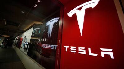 Tesla is one of only eight companies in the benchmark US stock index with a four-digit share price, Bloomberg says. AP Photo