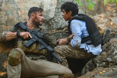 Chris Hemsworth and Rudhraksh Jaiswal in 'Extraction'. Photo by Jasin Boland