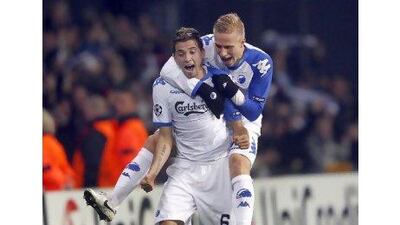 FC Copenhagen's Claudemir, front, and teammate Oscar Wendt celebrates a goal during the Champions League match between FC Copenhagen and Barcelona in Group D of the Champions League at the Parken Stadium in Copenhagen, Denmark, Tuesday, Nov. 2, 2010. (AP Photo/Lars Poulsen/POLFOTO) ** DENMARK OUT ''