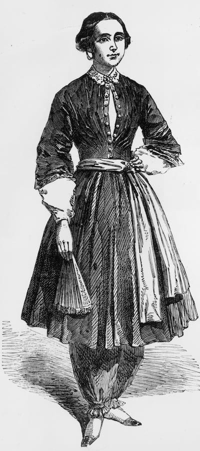 Amelia Bloomer, a champion of women's rights and dress reform, wearing the 'trousers' she designed, which were called bloomers, circa 1855. Getty Images