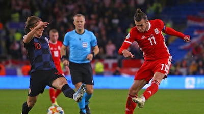 Wales' striker Gareth Bale has an unsuccessful shot under pressure from Croatia's midfielder Luka Modric. AFP