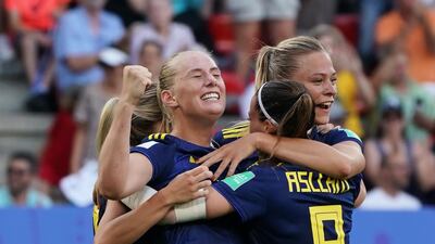 Stina Blackstenius celebrates with teammates after scoring the winning goal for Sweden against Germany. EPA