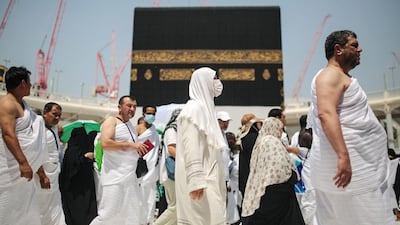 Muslim pilgrims circle the Kaaba, the cubic building at the Grand Mosque in the Muslim holy city of Mecca, Saudi Arabia. Mosa'ab Elshamy / AP Photo