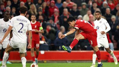 Wataru Endo of Liverpool takes a shot during the Europa League match against Toulouse. EPA