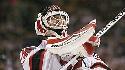 The Devils' Martin Brodeur smiles after breaking Patrick Roy's record for minutes played in the NHL.