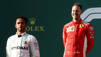 It was all smiles for Sebastian Vettel at the Australian Grand Prix this weekend but Lewis Hamilton, left, was left frustrated. Brandon Malone / Reuters