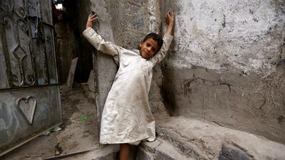 A boy stands outside his family's house amid a cholera outbreak in a poor neighbourhood of Sanaa, Yemen on July 10, 2017. Reuters / Khaled Abdullah