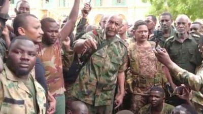 A screen grab from a video released by Sudan's military shows Gen Abdel Fattah Al Burhan with troops. Reuters